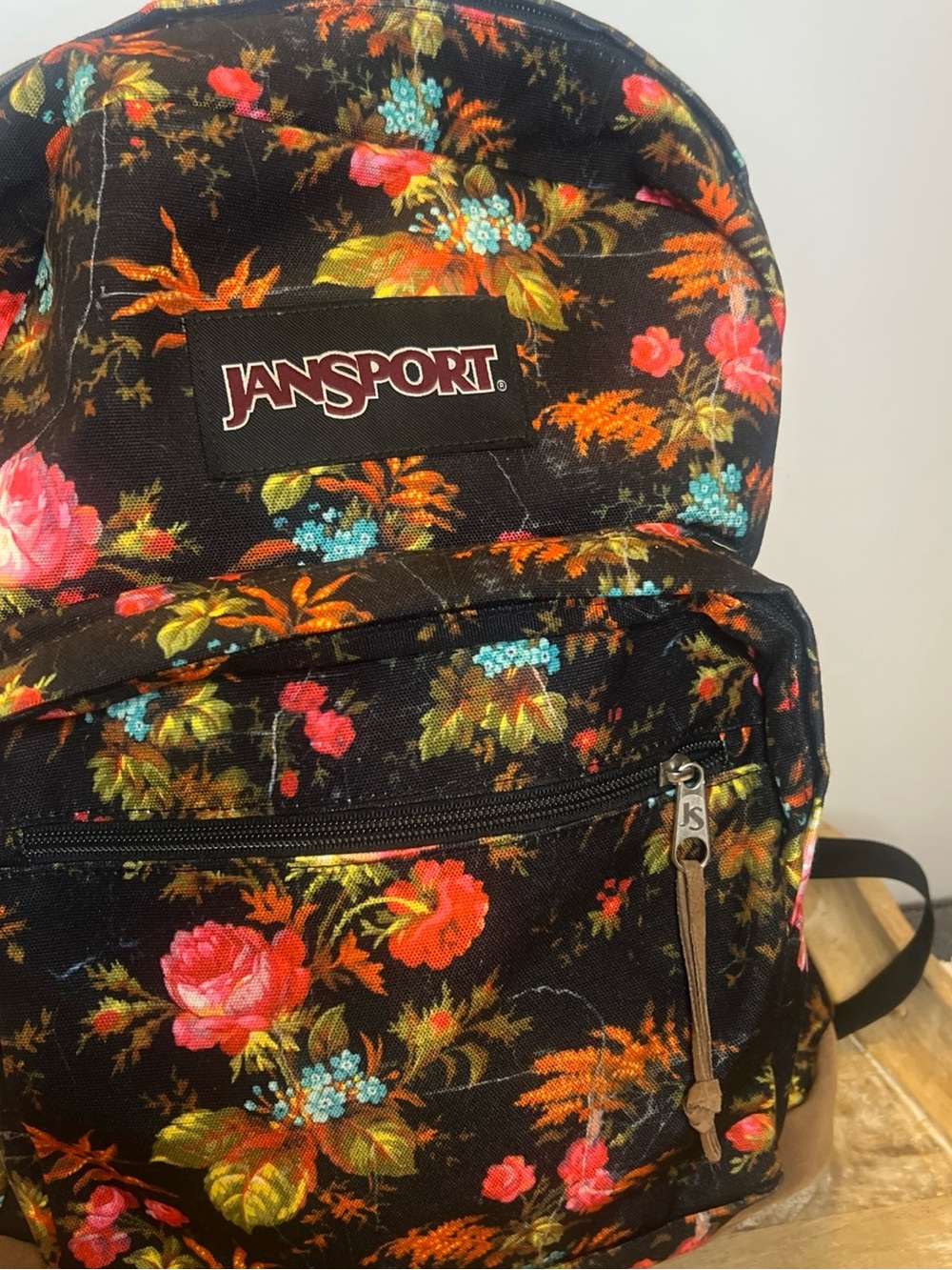 Jansport Black Floral Backpack with Pink and Orange Blooms